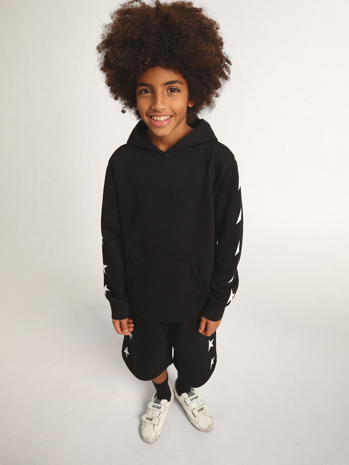 Boys' hooded sweatshirt in black with contrasting white stars