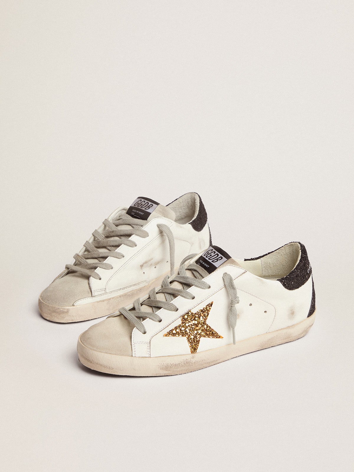 Women's Super-Star in nappa leather with gold glitter star and black glitter heel tab