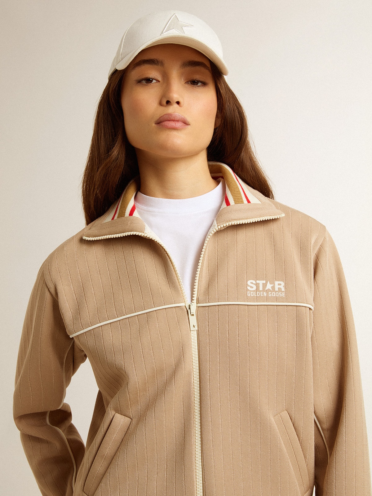 Women's light beige zipped sweatshirt with white logo
