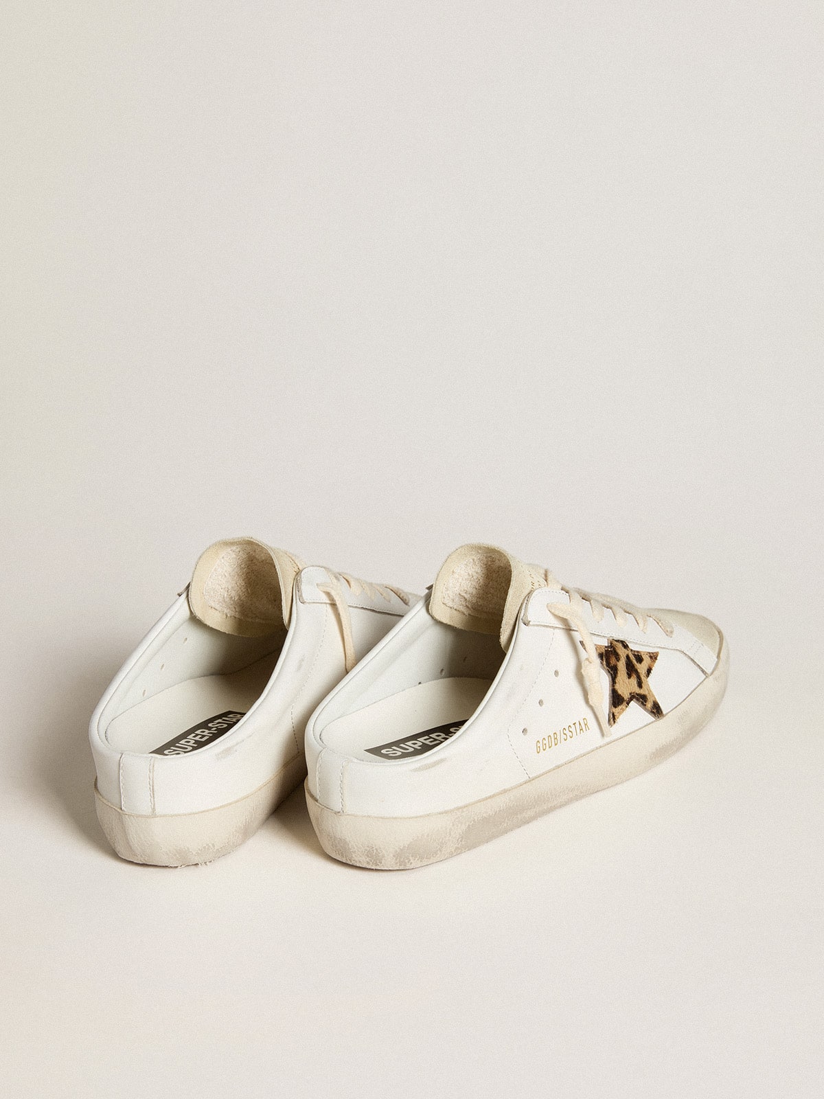 Super-Star Sabots with pony skin star and beige suede tongue