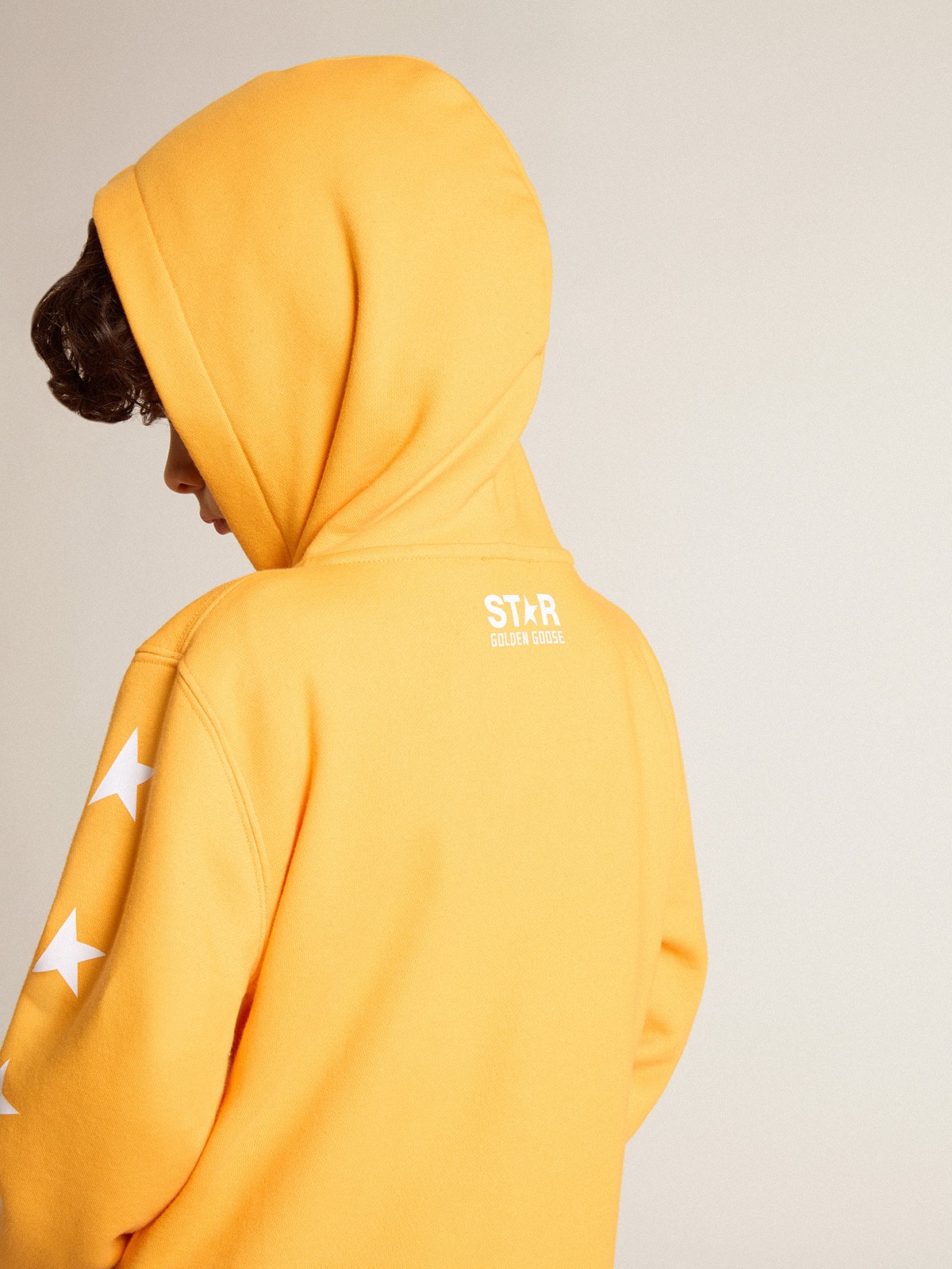 Boys' orange sweatshirt with zip fastening