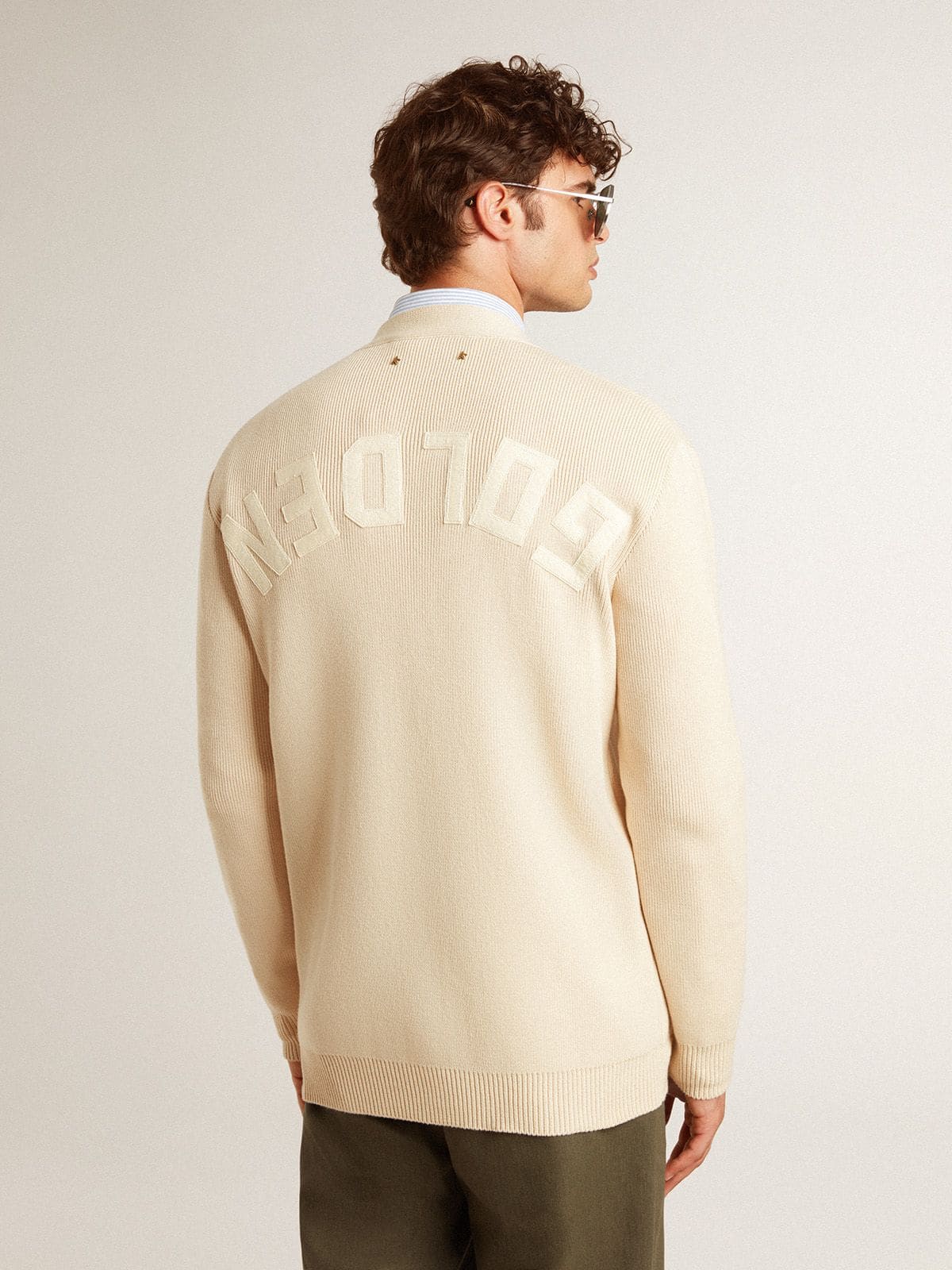 Men's beige cardigan with 'Golden' lettering on the back