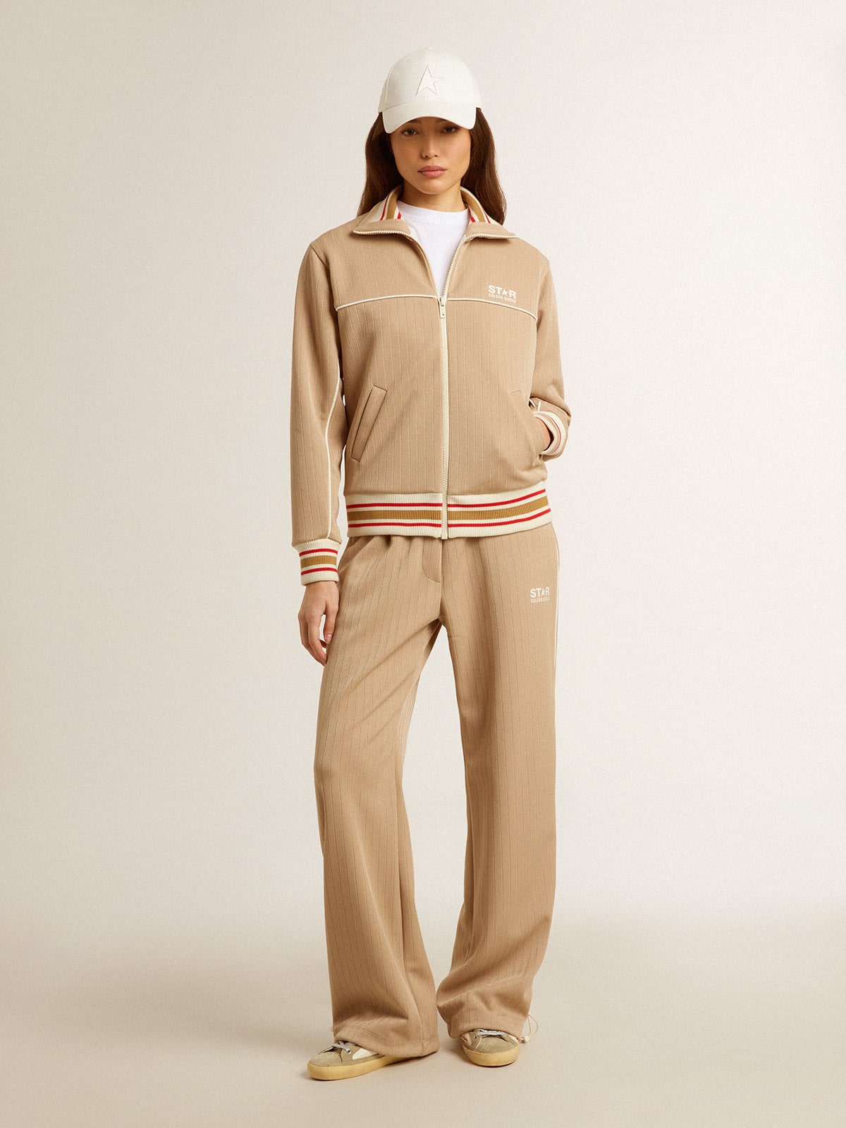 Women's light beige joggers with white logo