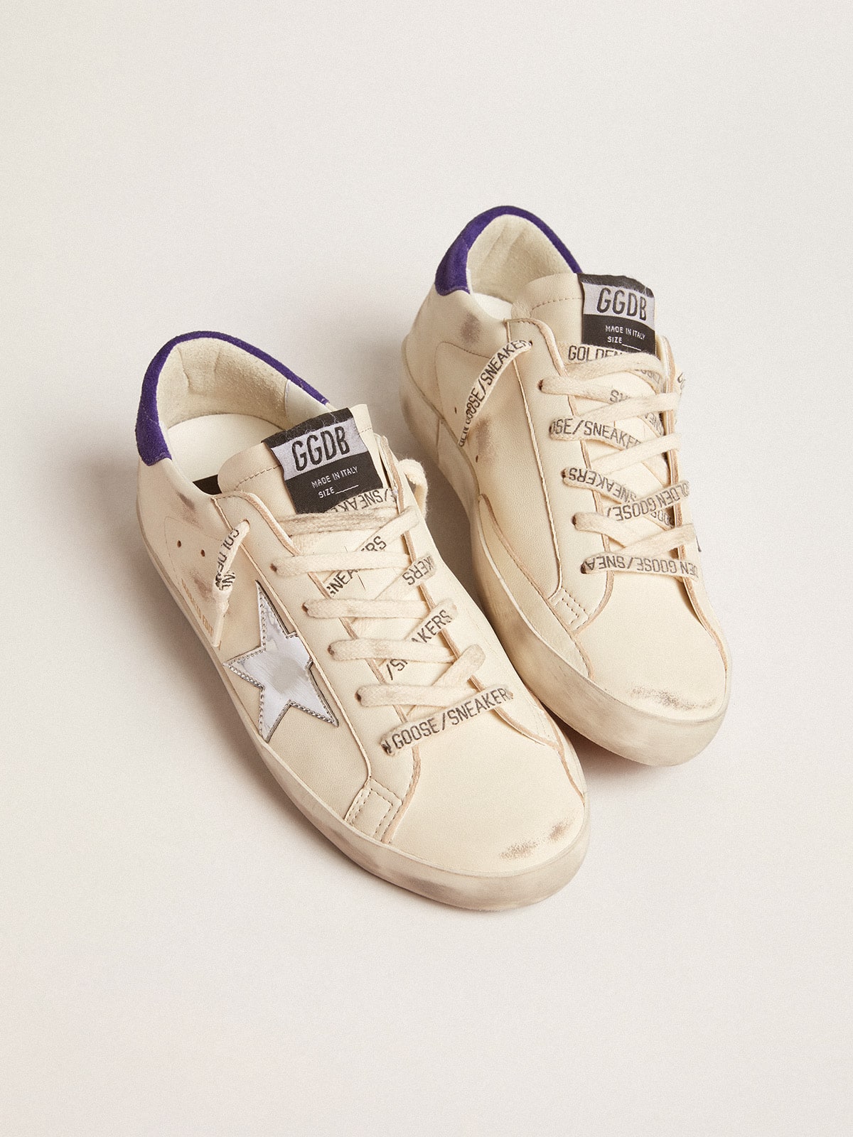 Super-Star LTD in nappa with metallic star and purple suede heel tab