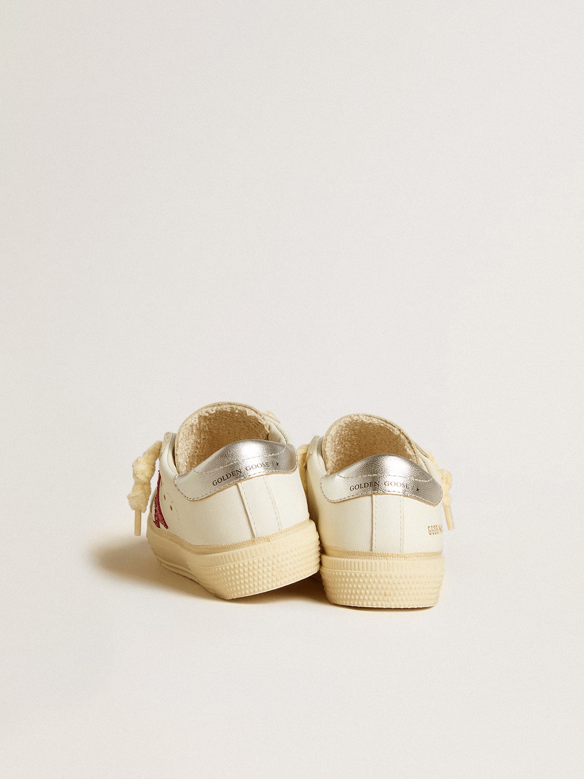 May Junior with fuchsia glitter star and metallic leather heel tab