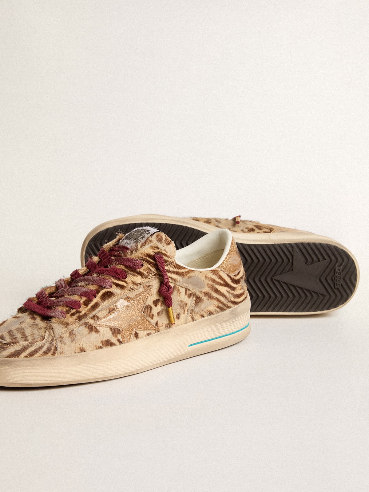 Women's Stardan LTD in animal-print pony skin with gold glitter star