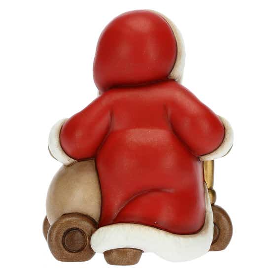 Father Christmas on scooter