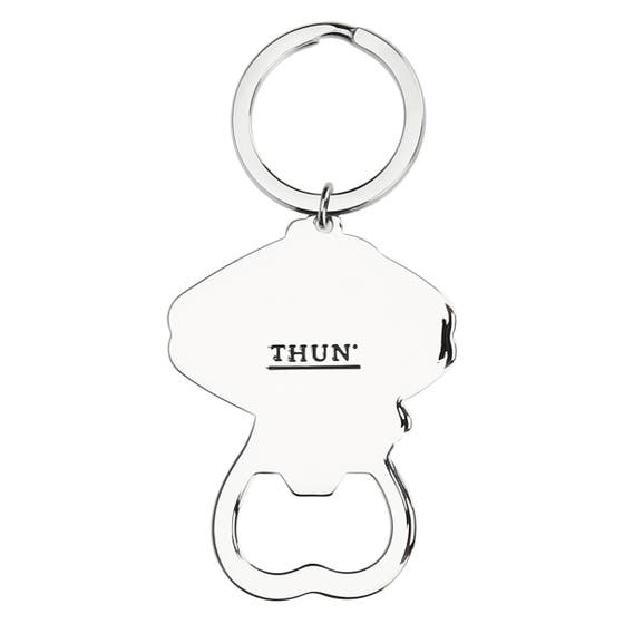 Metal bottle opener with graduation good-luck charm