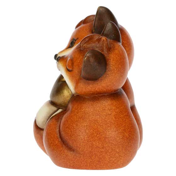 Fox couple with golden heart