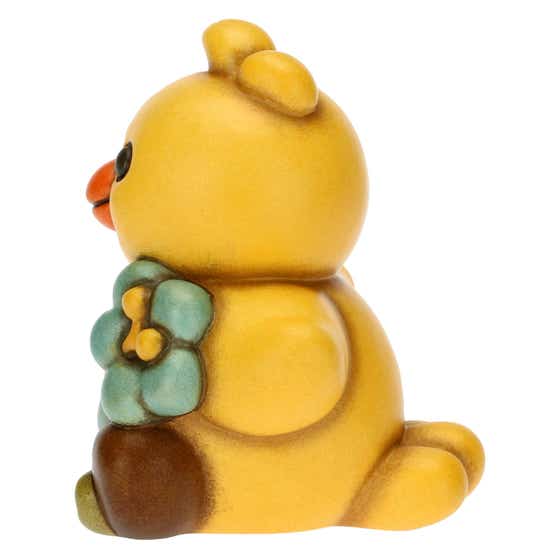 Small chick with flower