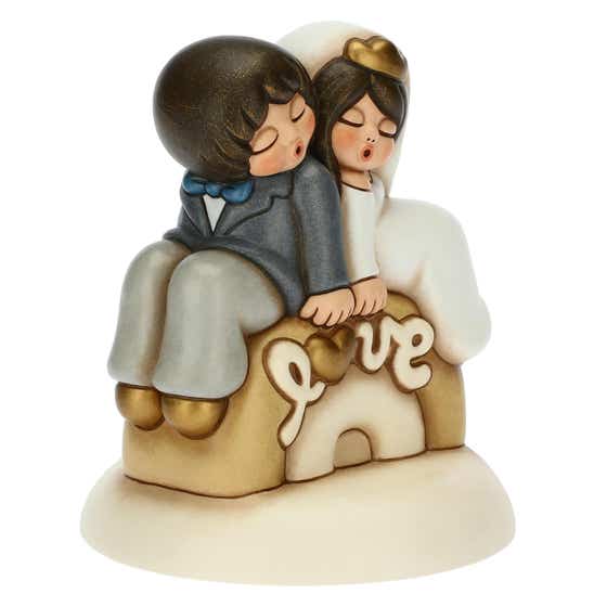 Newlyweds love cake topper