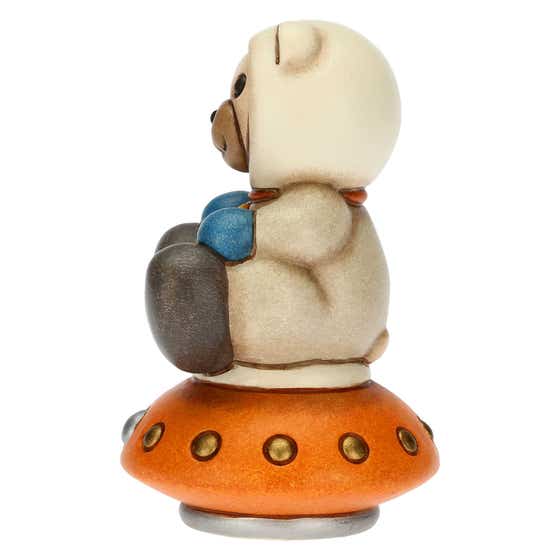 Teddy astronaut on spaceship