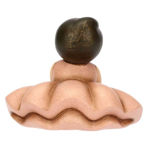 Sitting pink ceramic ballerina