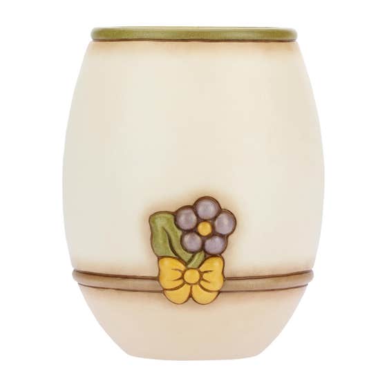 Country vase with flowers and lucky ladybird