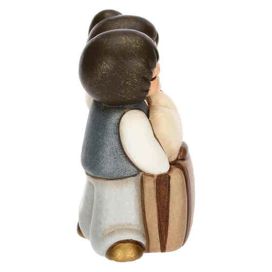 Ceramic newlyweds travelling with heart and briefcase, small