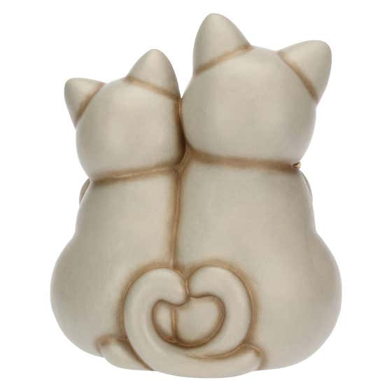 Pair of ceramic cats in love