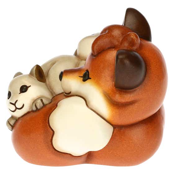 Fox and squirrel lying down