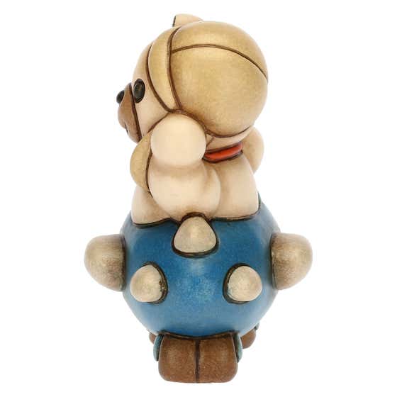 Teddy Motors on an aeroplane