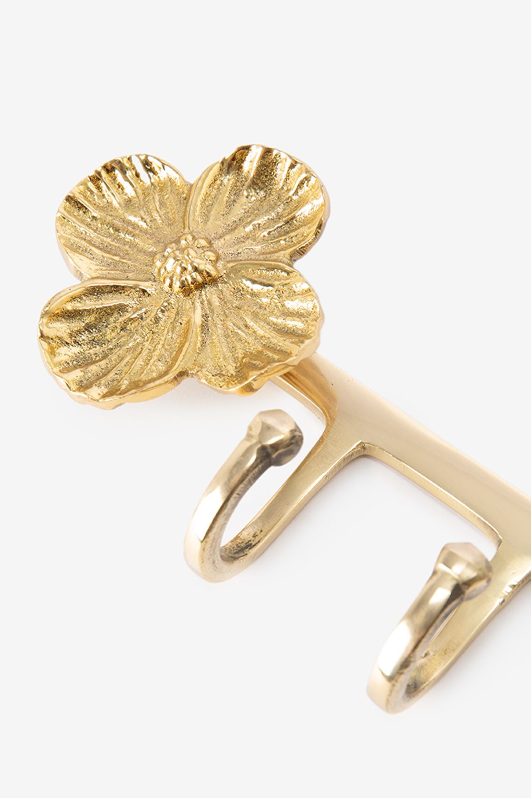 Goudkleurige kapstokhaken met bloemen