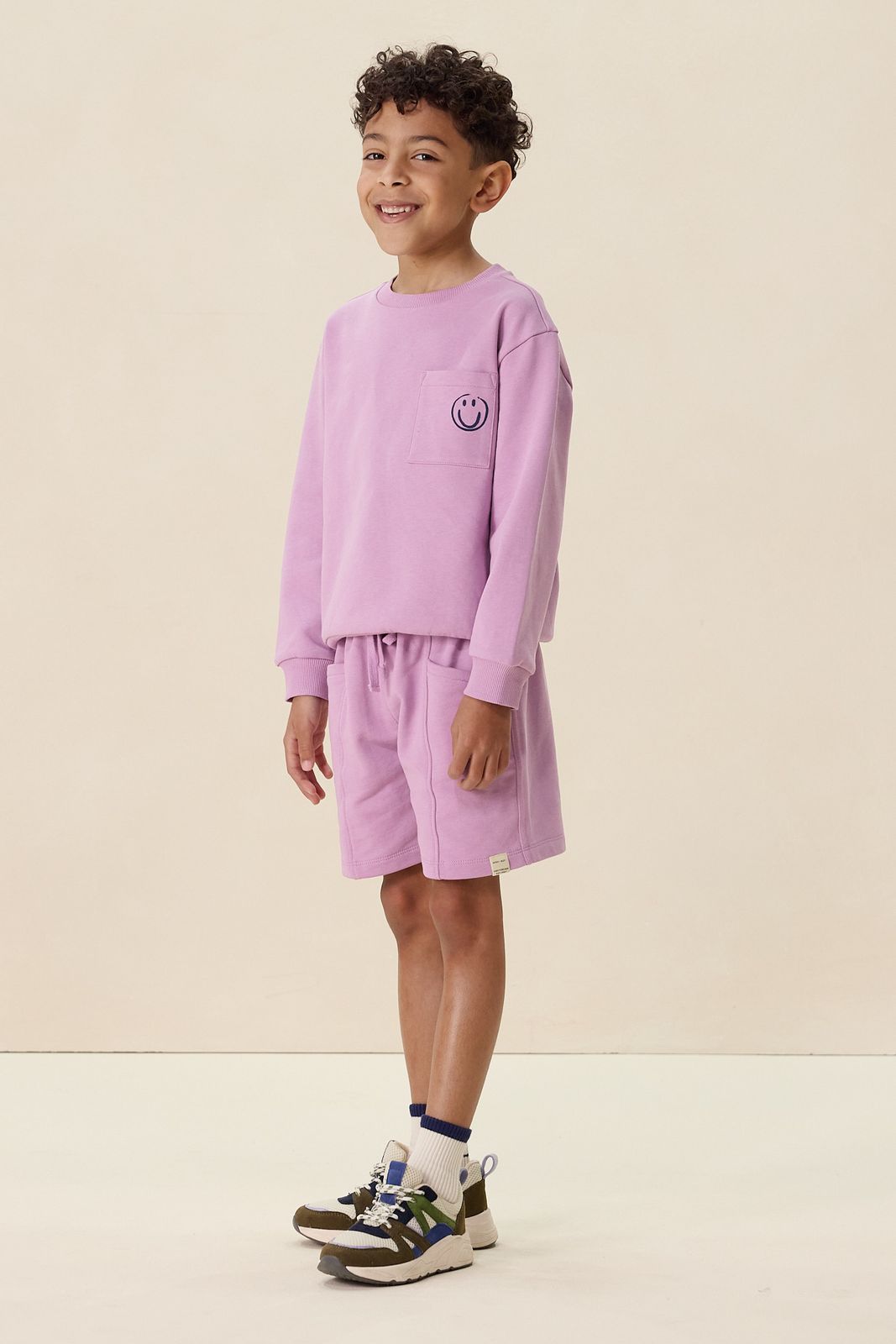 Lichtpaarse sweater met artwork