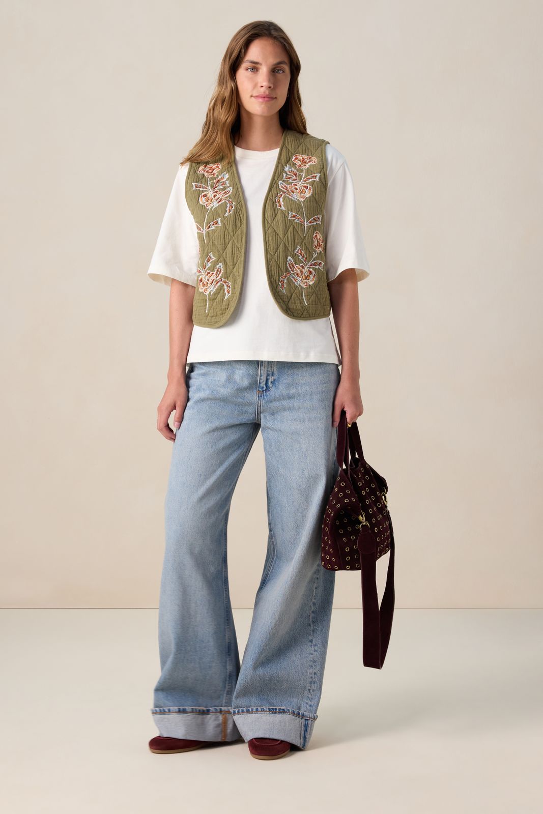 Donkergroen gilet met embroidery