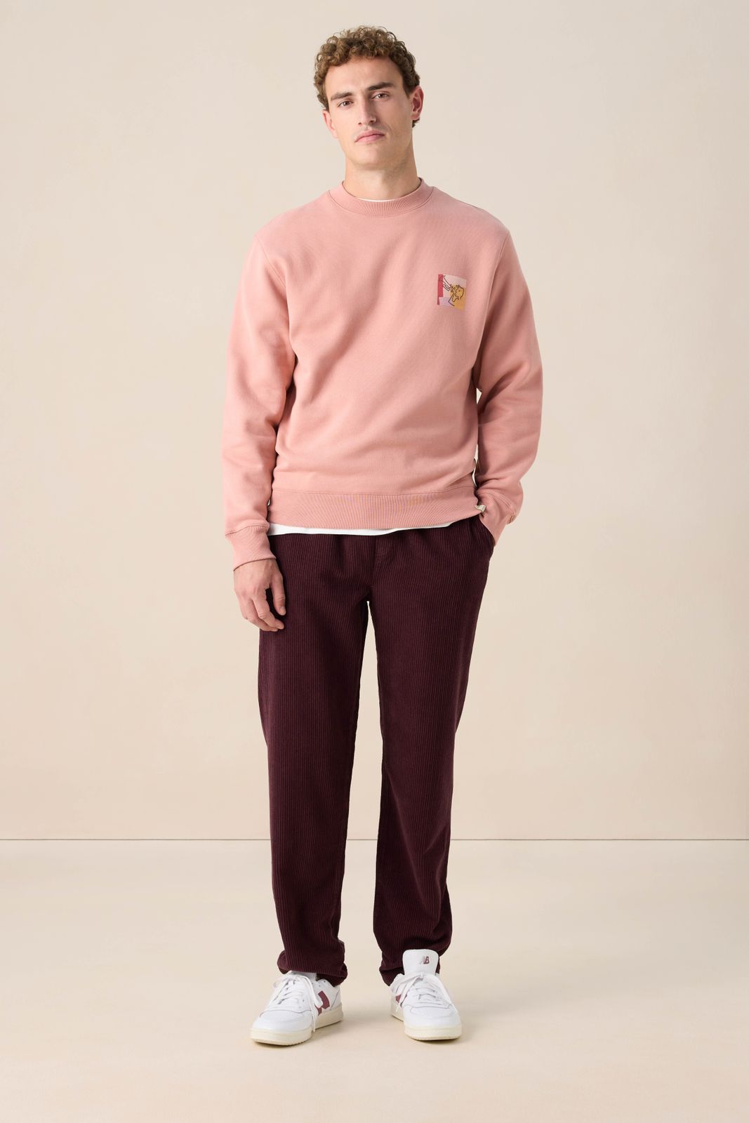 Roze sweater met artwork