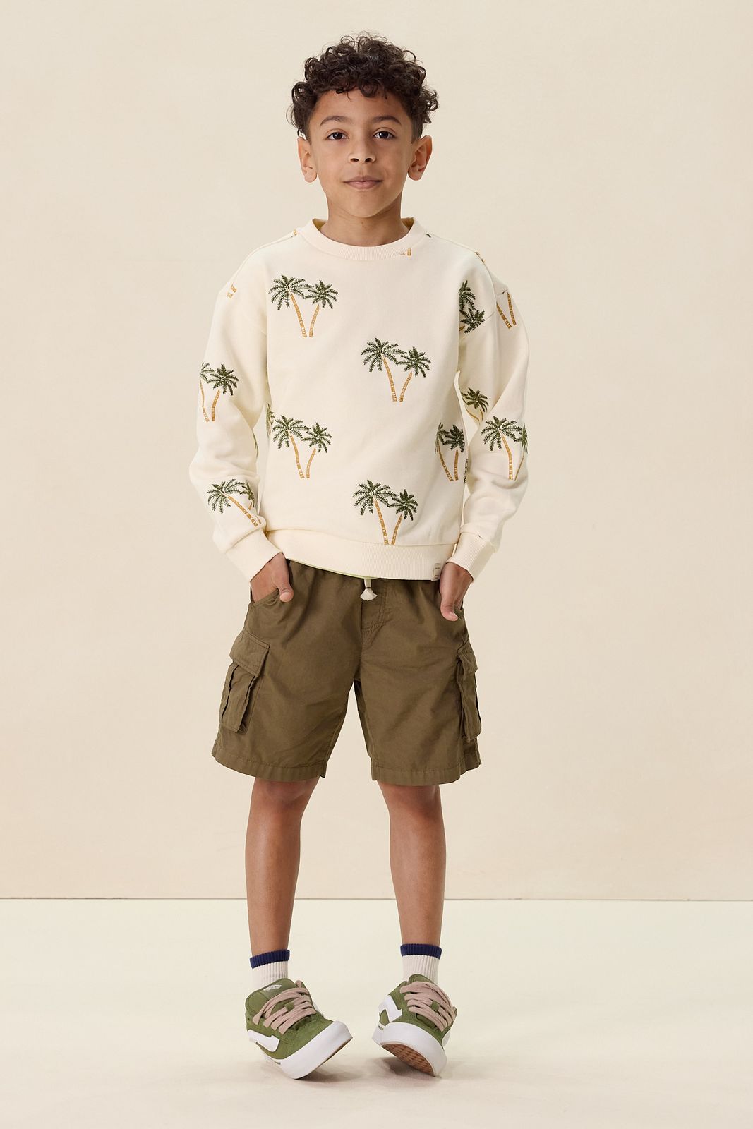 Witte sweater met palmboom