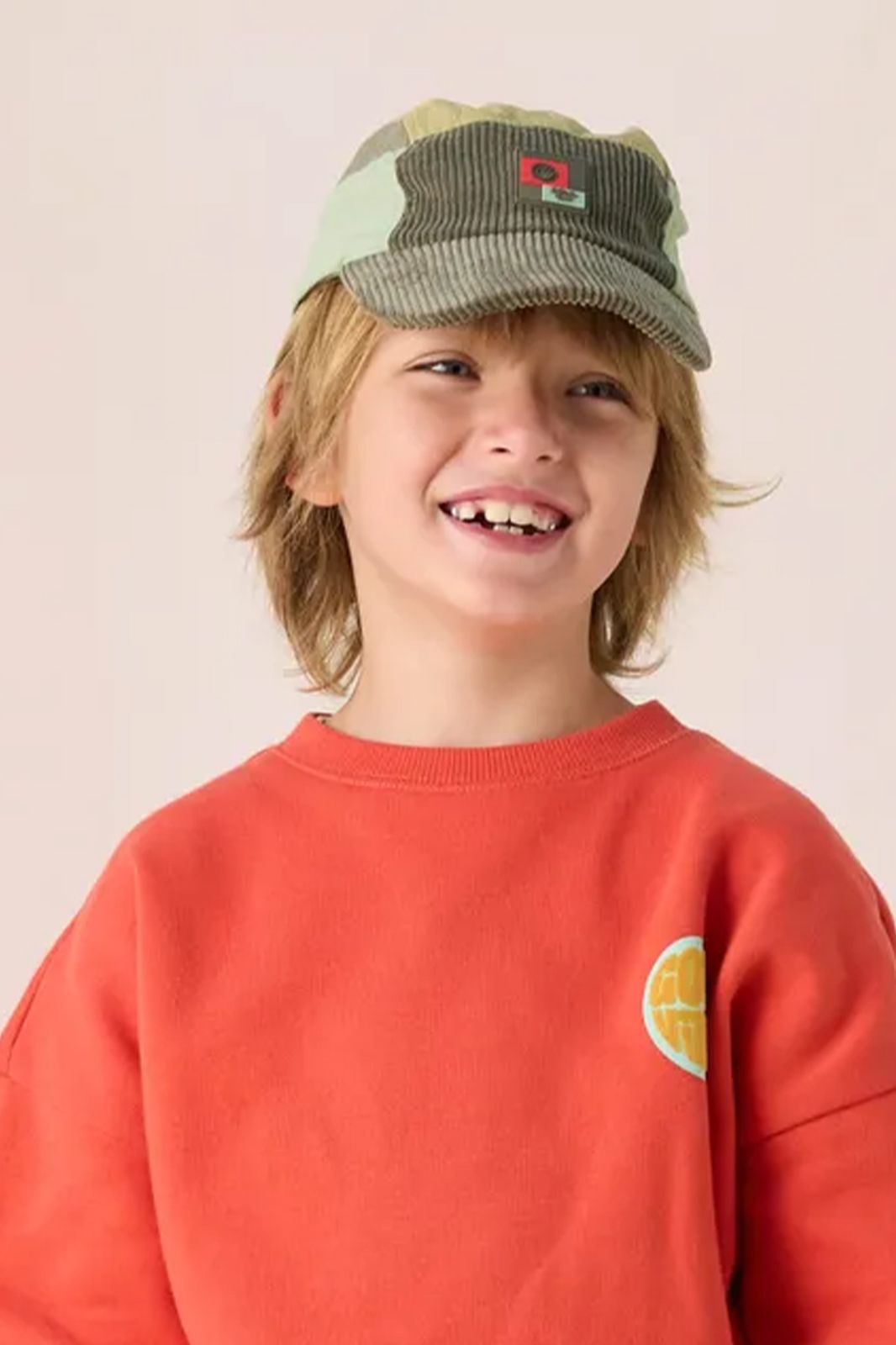 Donkergroene colourblock pet met patch