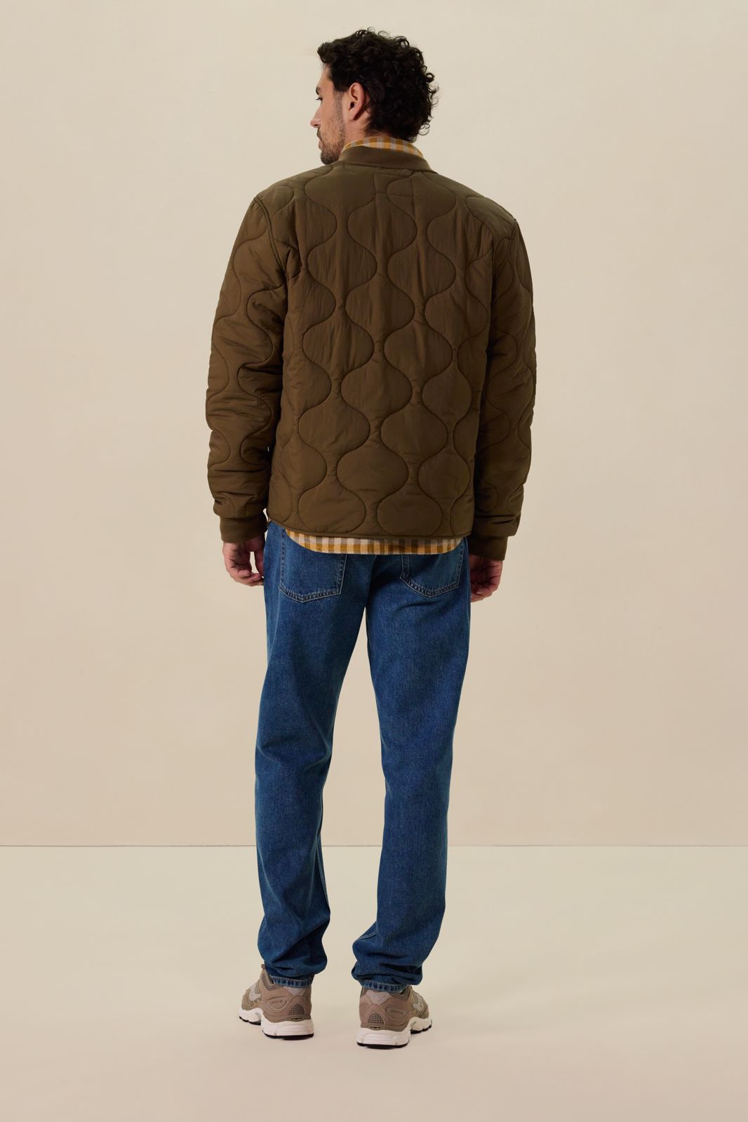 Donkergroene quilted jas