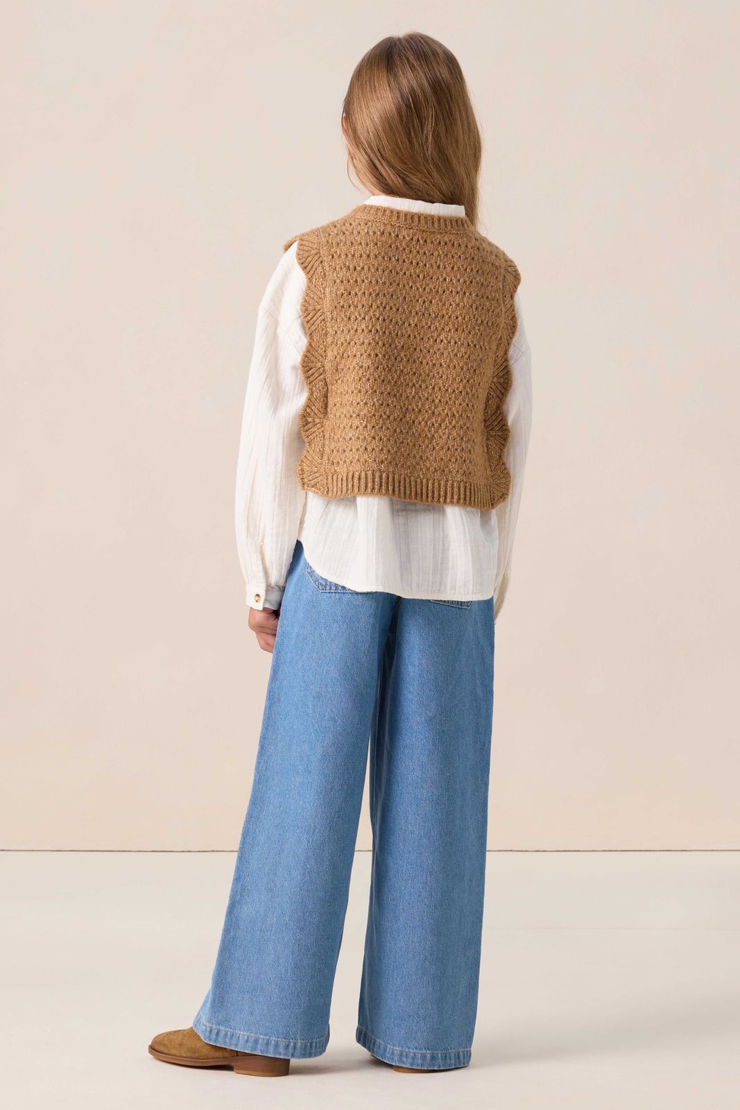 Bruine spencer met geschulpte randen