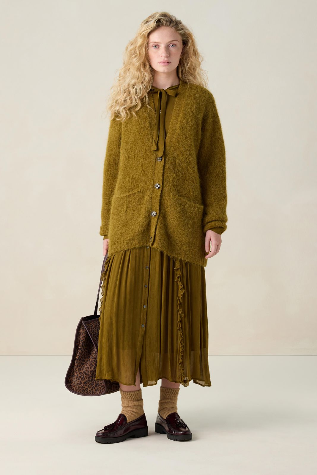 Donkergroen vest met V-hals