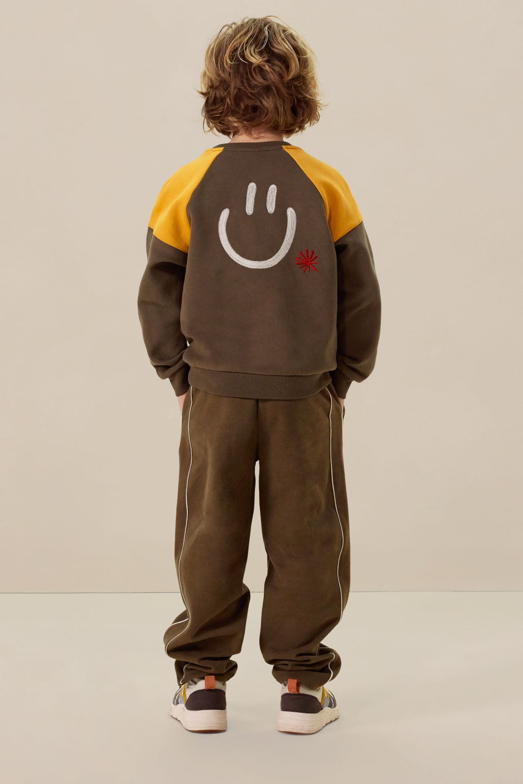 Donkergroene colourblock sweater met artwork