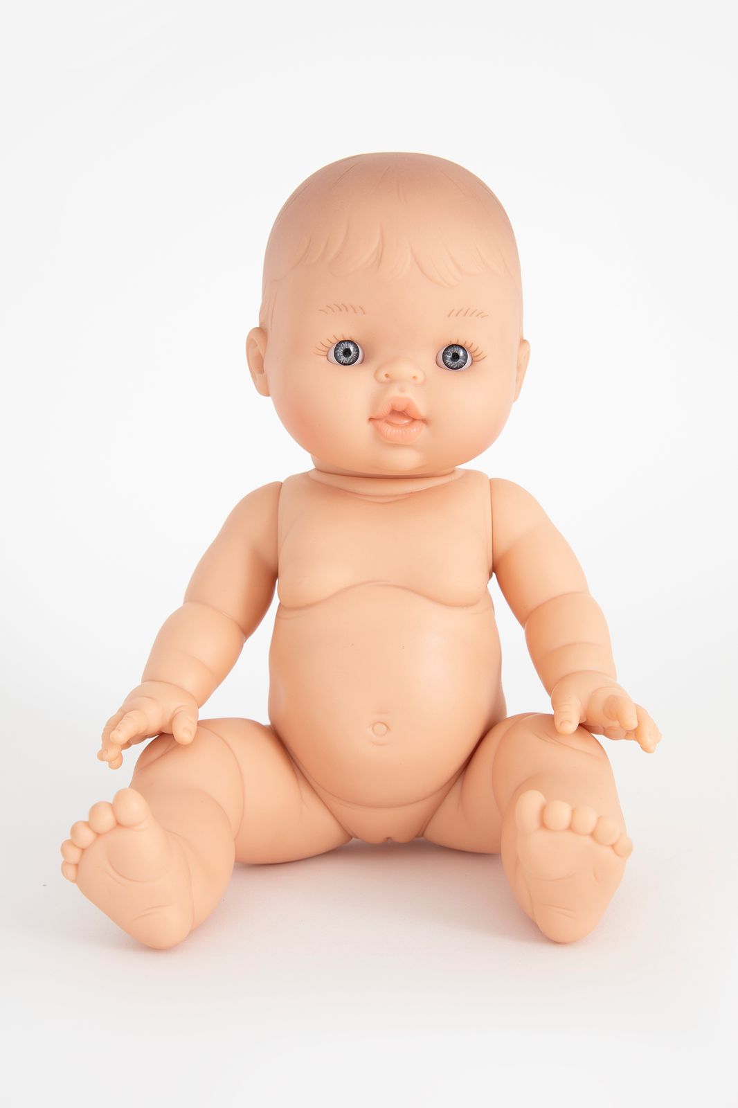 Pop blauwe ogen en zonder haar