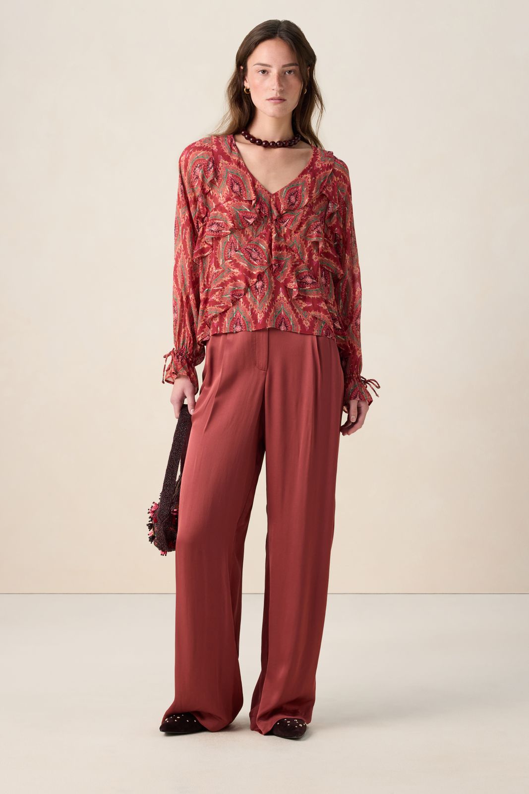 Rode ruffle blouse met print