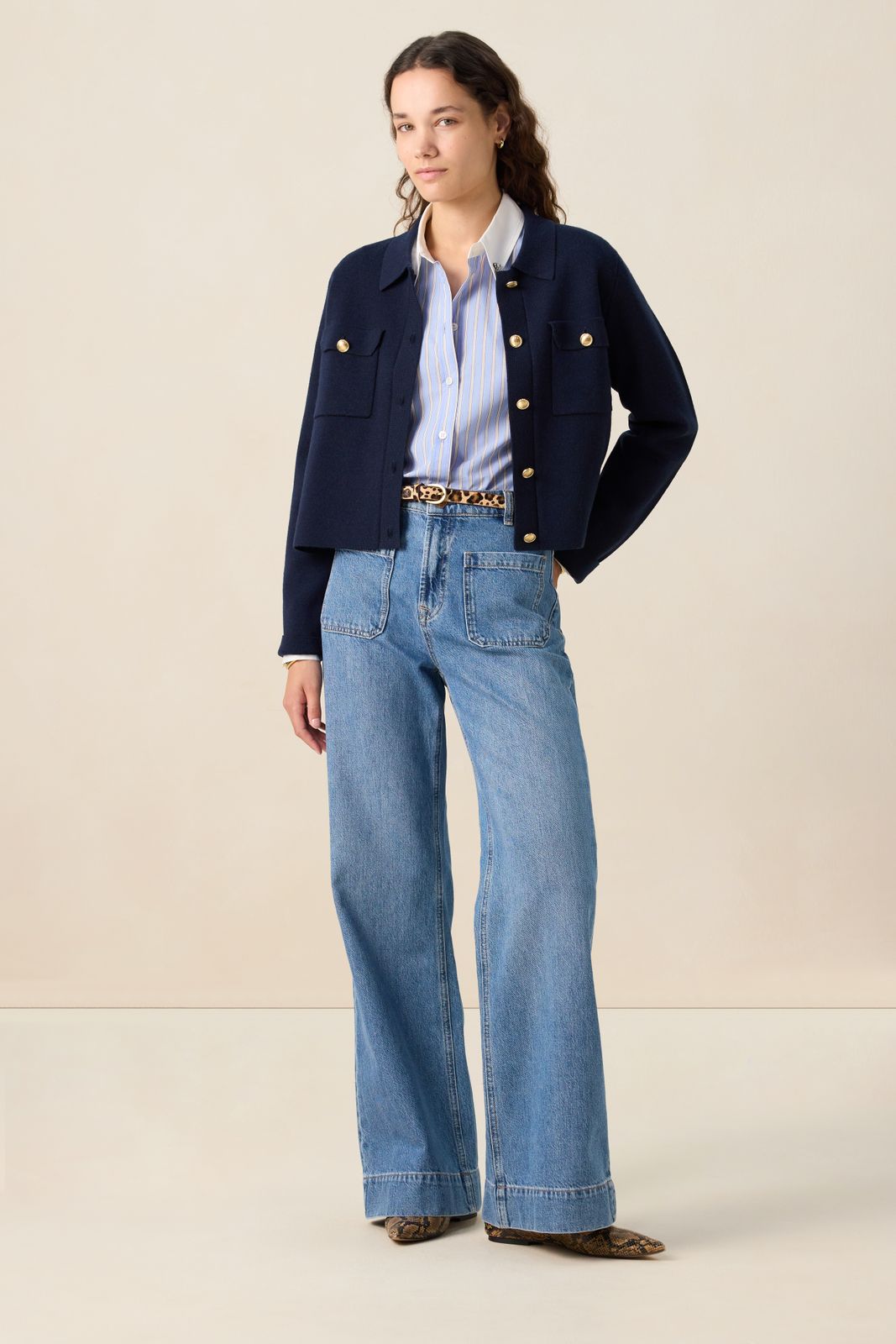 Donkerblauw vest met gouden knopen