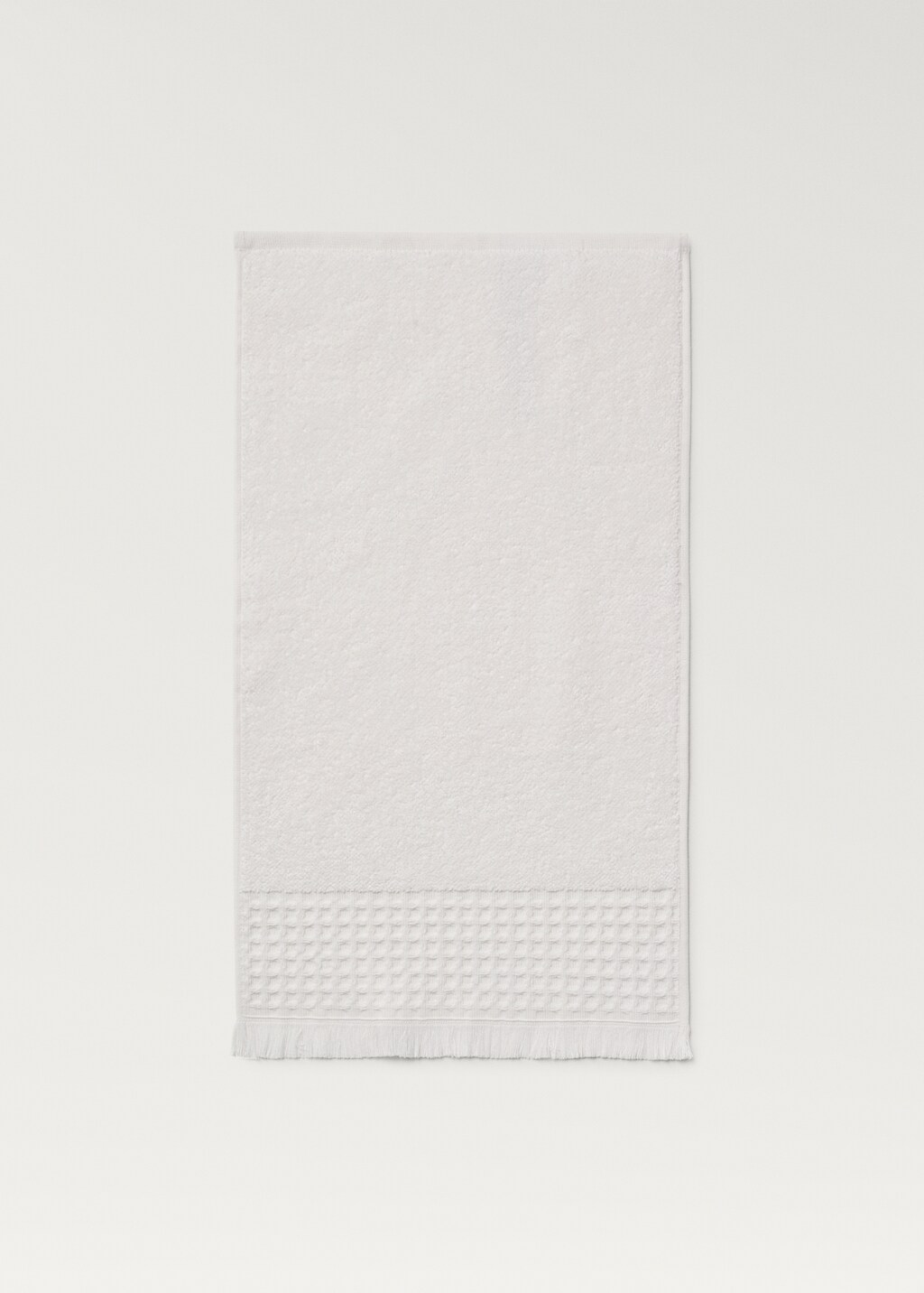 Hand towel with waffle trim and fringe - Off White