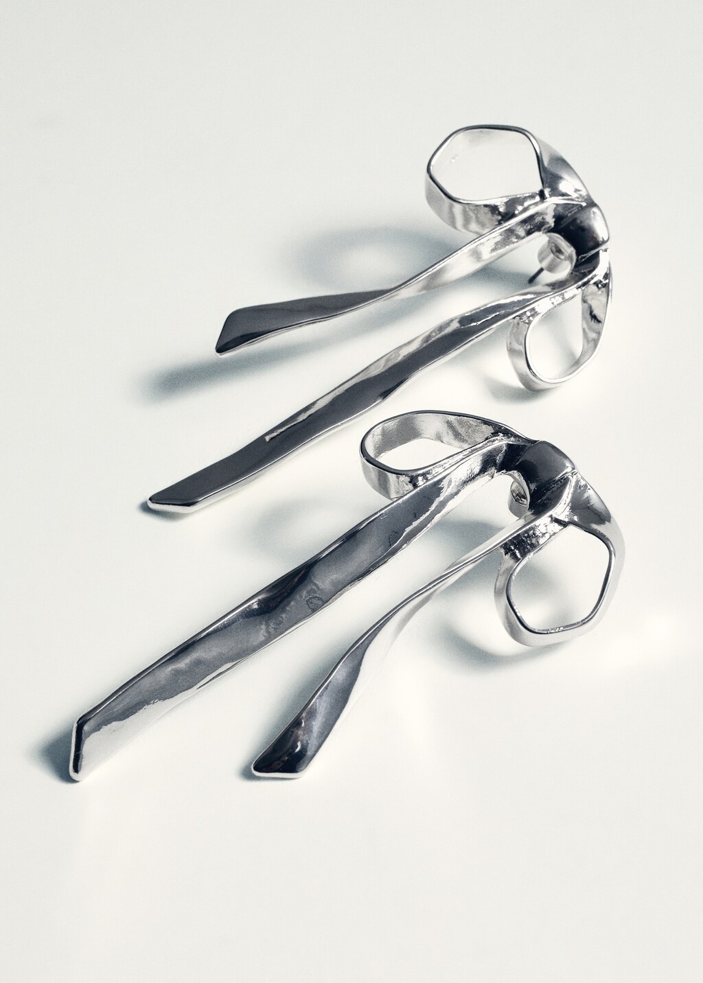 Rigid bow earrings - Silver