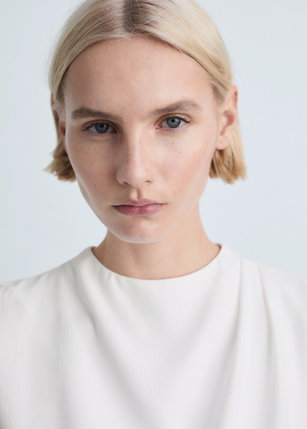 Sleeveless draped blouse - Black