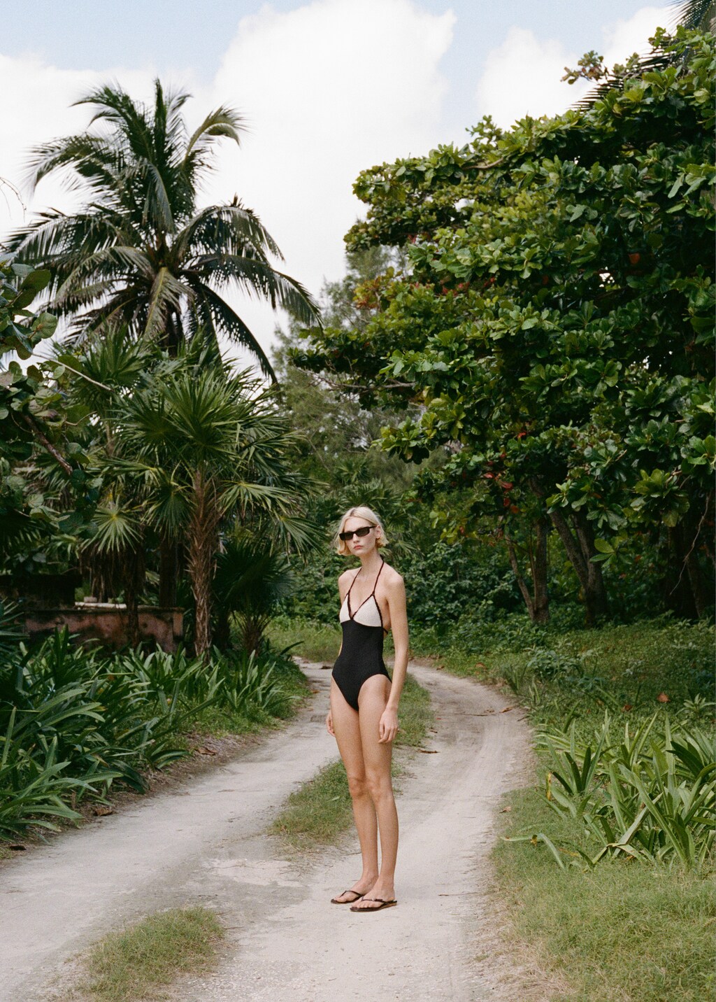 Combined knitted swimsuit with crochet appliqué - Black