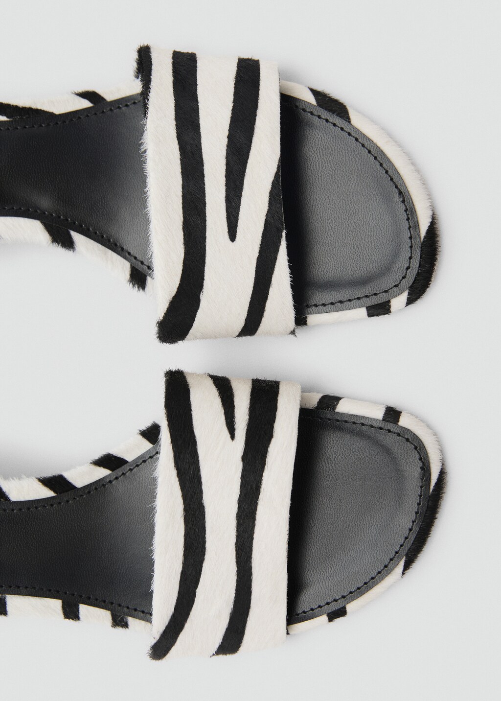 Zebra-print fur sandals - White