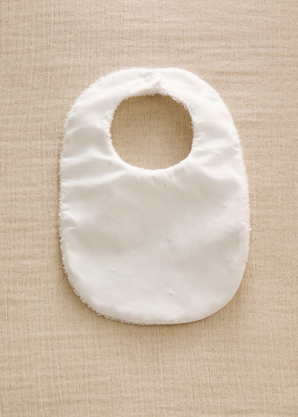 Terry cloth bib with embroidered details - White