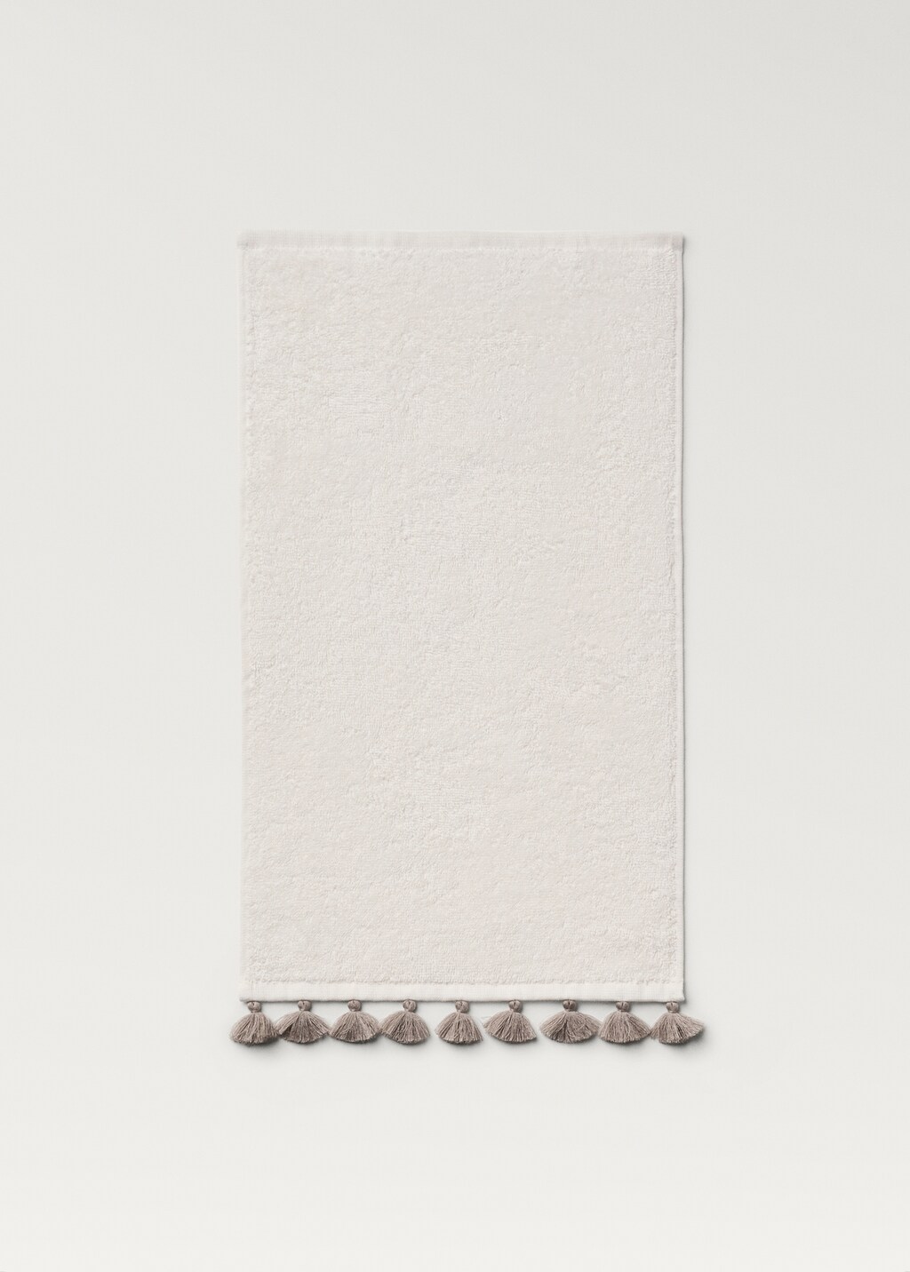 Contrasting pom-pom hand towel - White