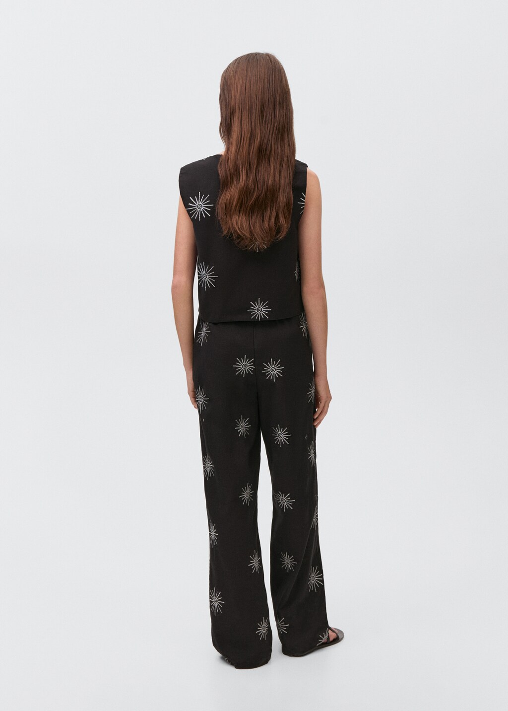 Long trousers with embroidered details - Black