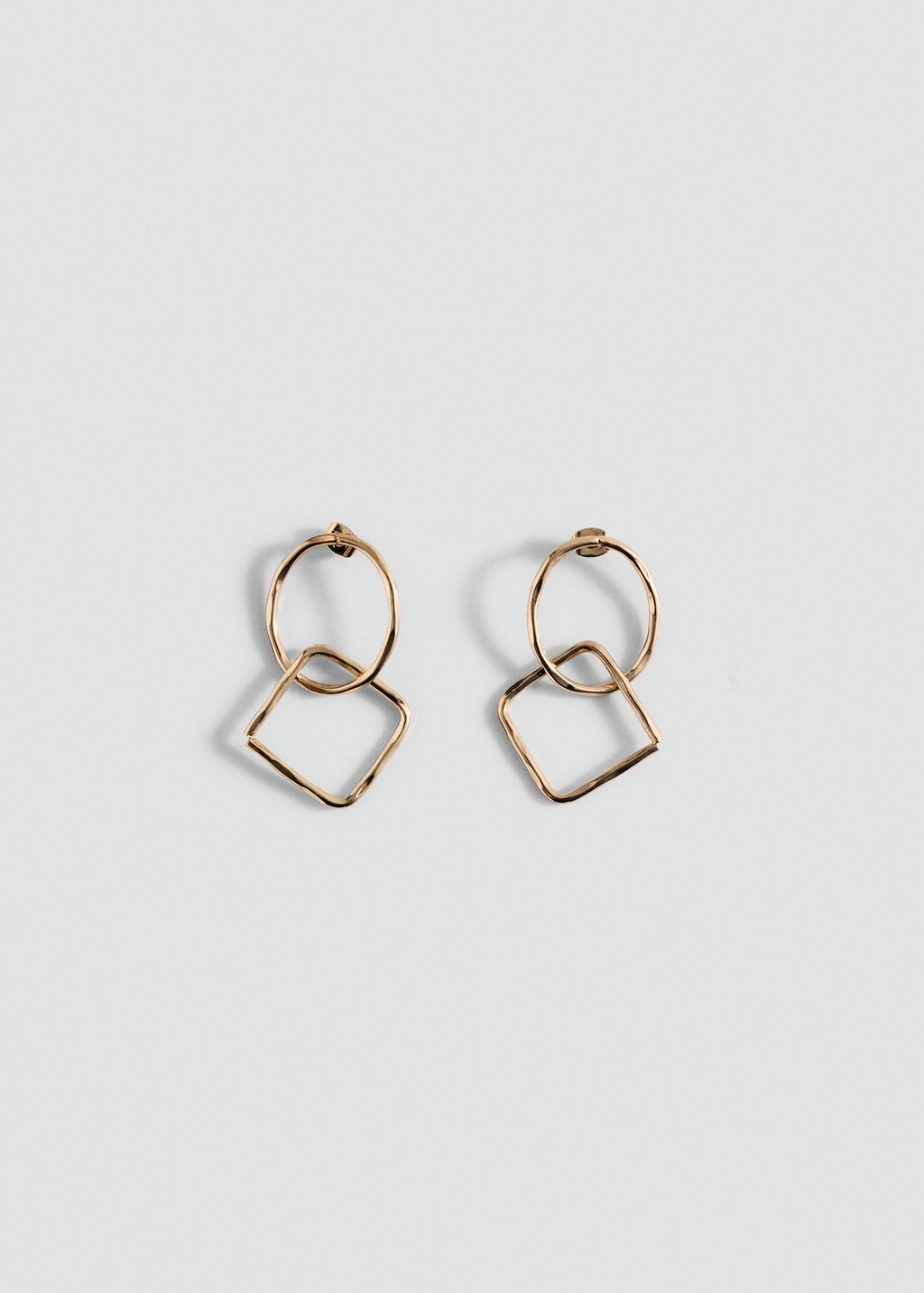 Intertwined design earrings - Gold