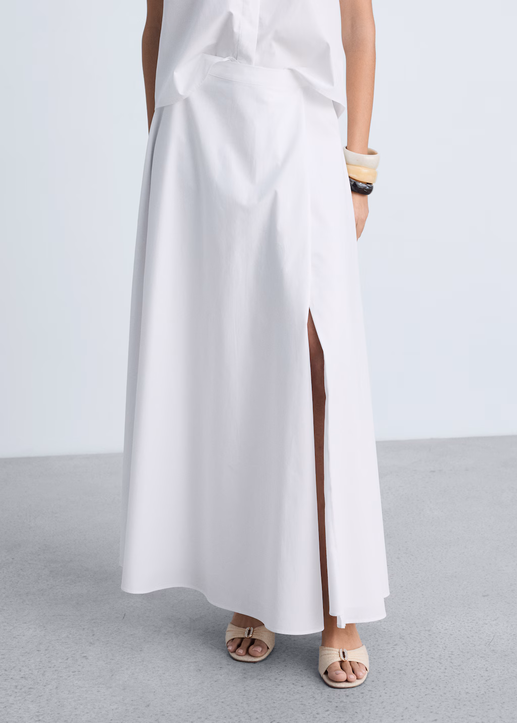 Long flared skirt with opening - White