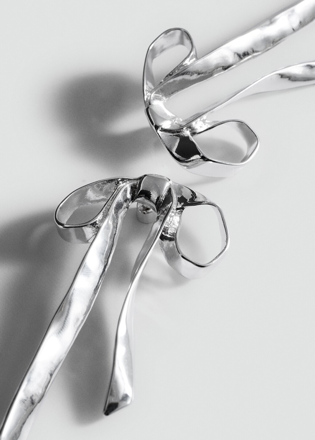 Rigid bow earrings - Silver