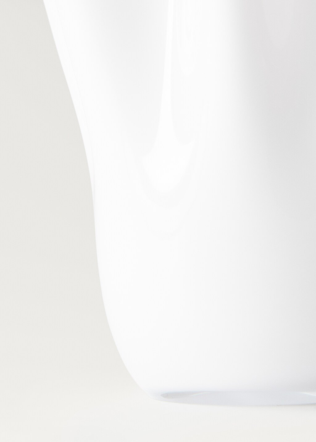 Irregular hand-blown glass vase - White