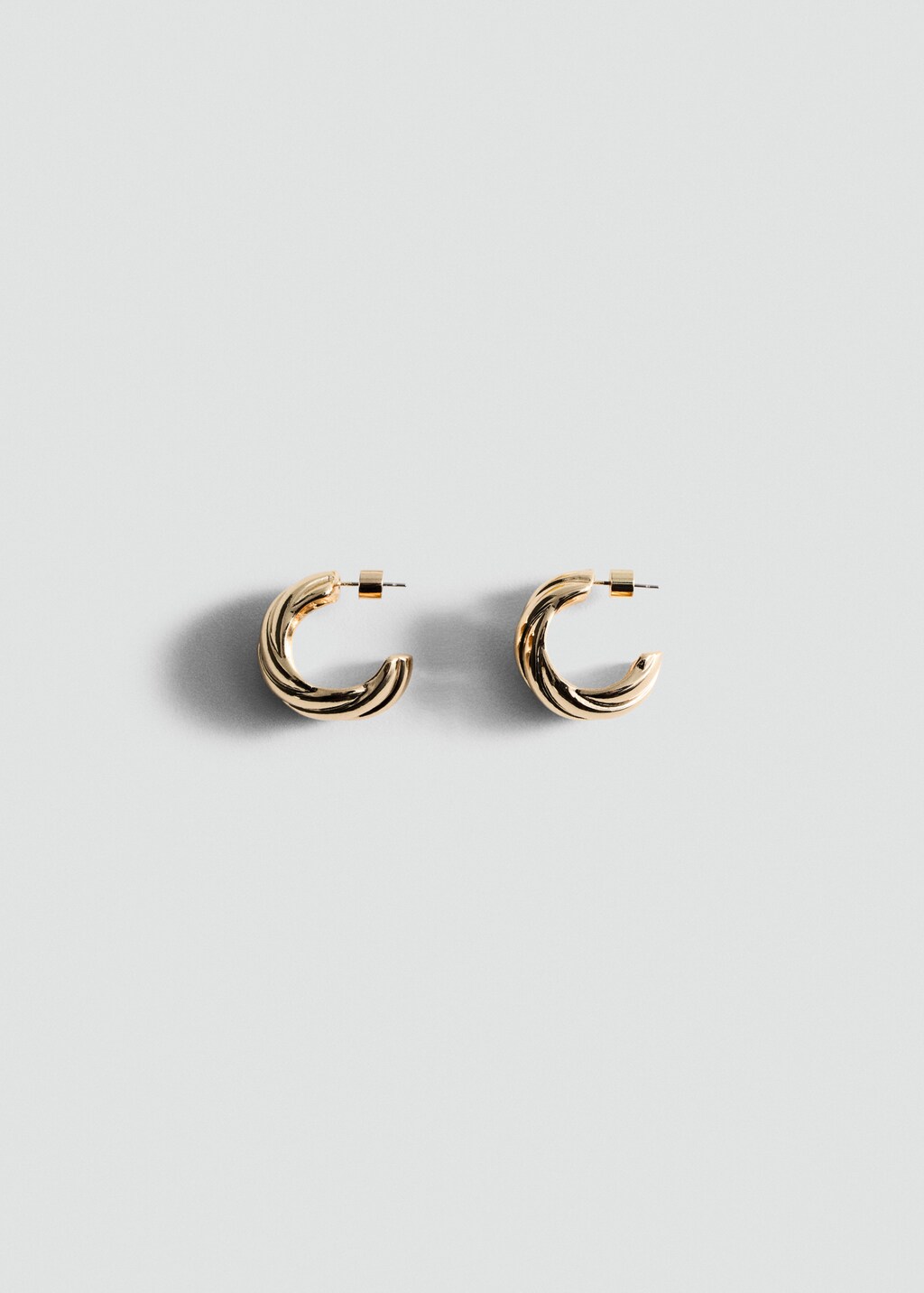 Intertwined hoop earrings - Gold
