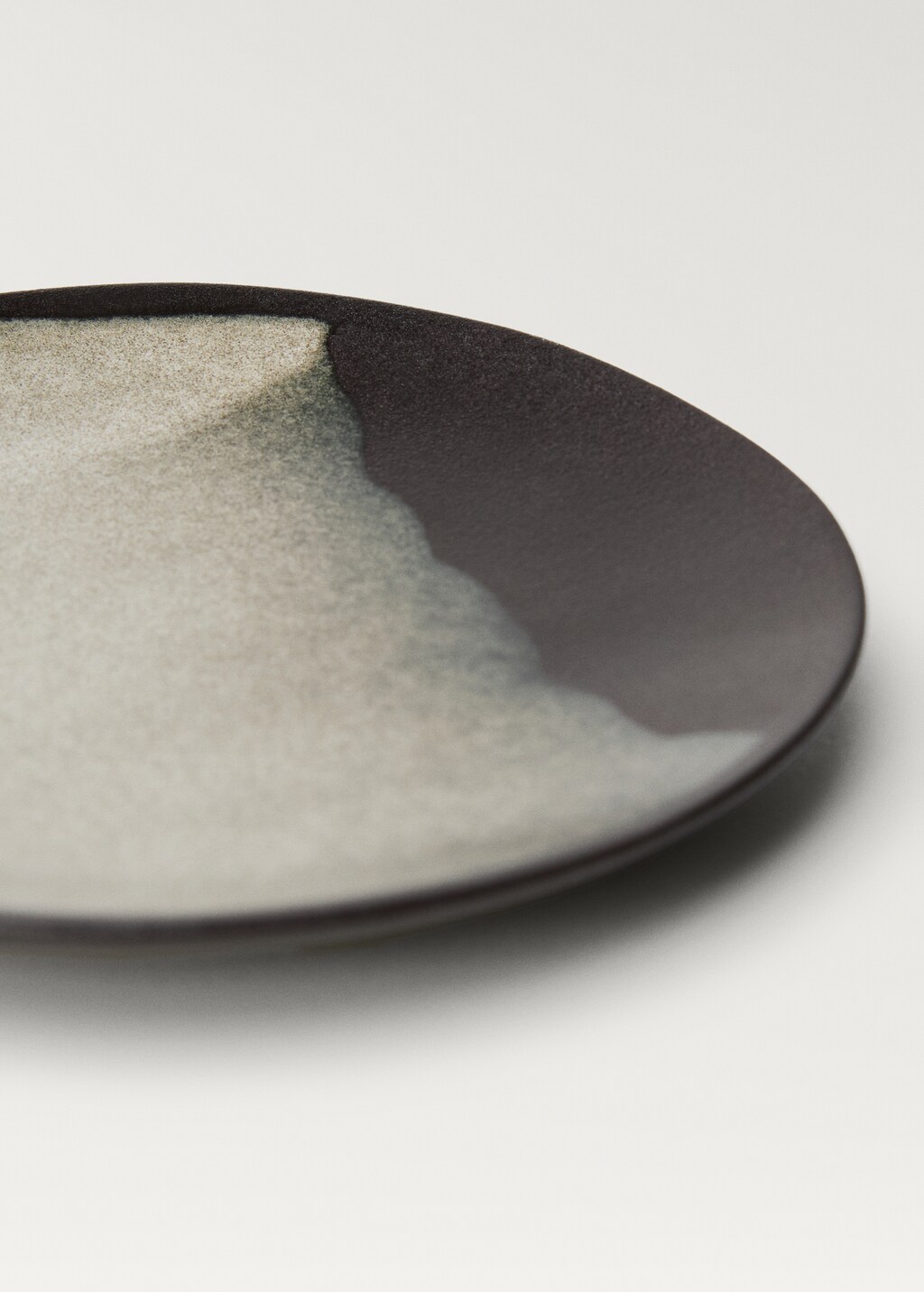 Reactive decorated stoneware dessert plate - Black