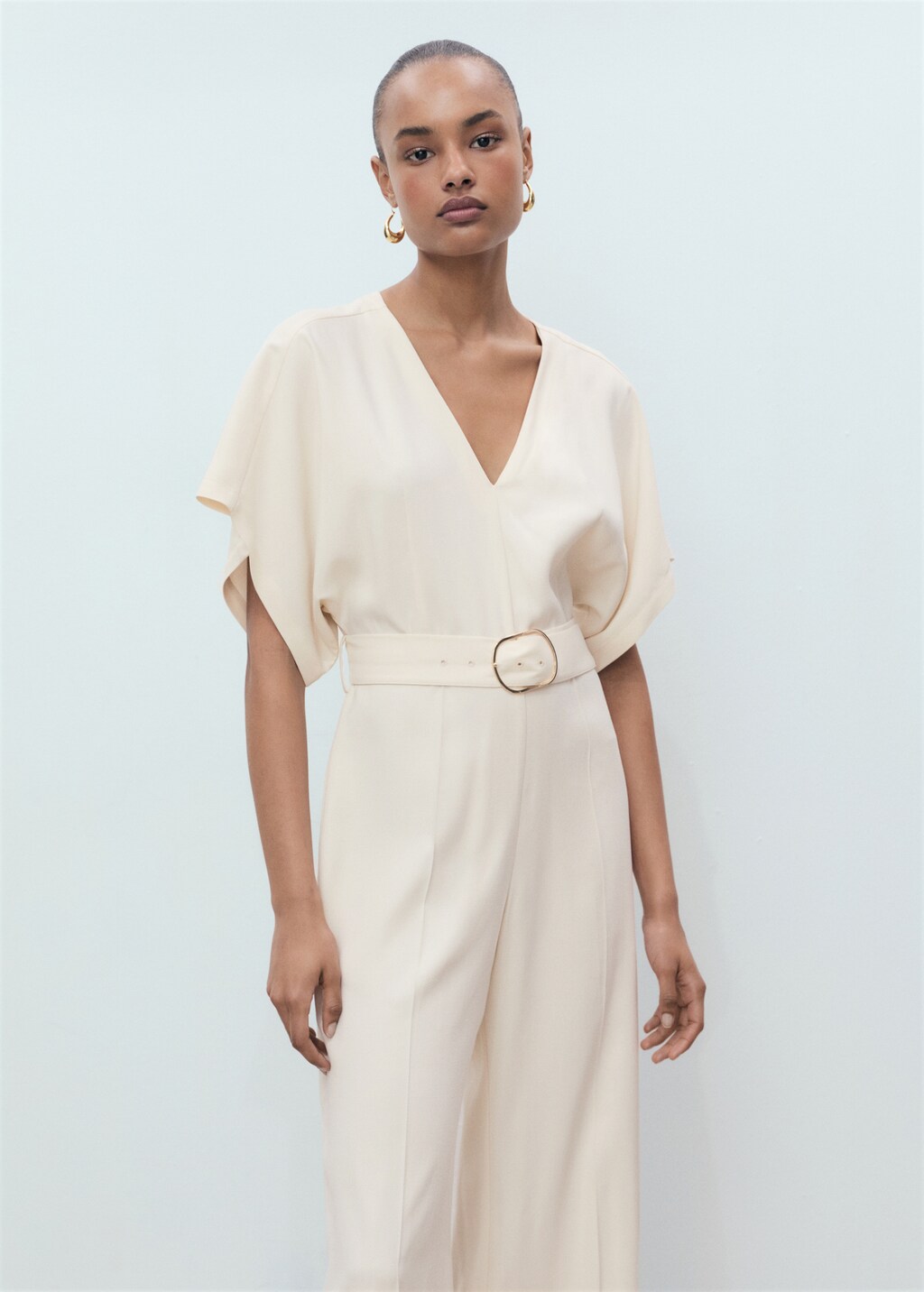 Long jumpsuit with belt and buckle - Ecru